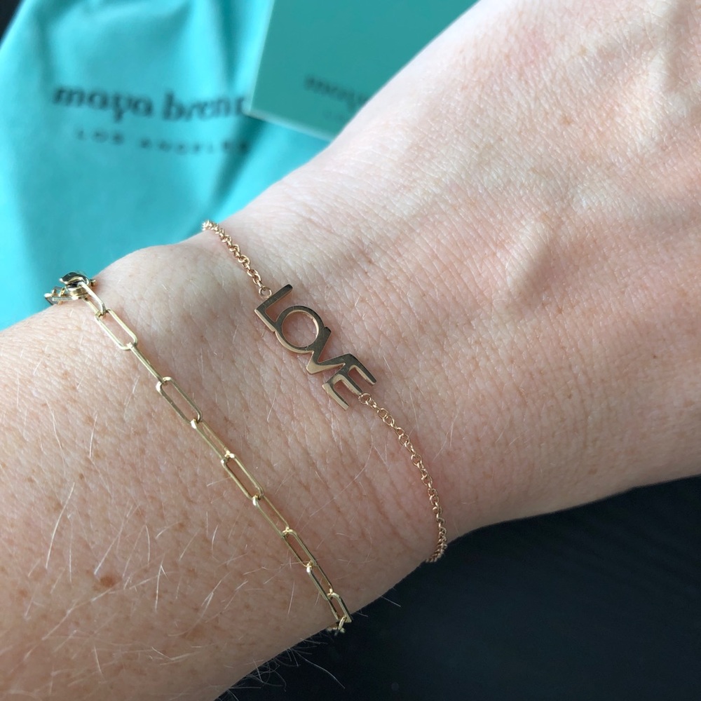 Maya Brenner gold LOVE bracelet